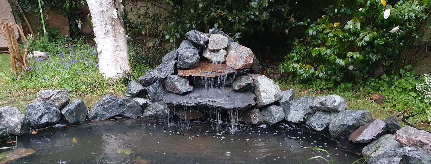 Ledge Waterfall System Integration by Green Architects